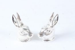 A PAIR OF PLATE HARE SALTS.