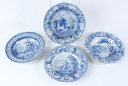 FOUR 19TH CENTURY TRANSFER PRINTED BLUE AND WHITE BOWLS, each depicting rural landscapes with
