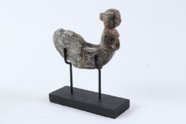 AN INDIAN CARVED GREEN HARDSTONE FIGURE, 19TH / 20TH CENTURY, modelled as the front end of a