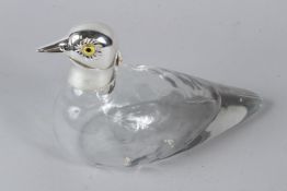 A DUCK SHAPED GLASS CLARET JUG with plated mounts. 20cms long.
