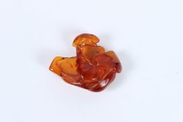 A CHINESE NATURAL AMBER. 9 grams.