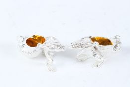 A PAIR OF PLATE FROG AND SNAIL SALTS.