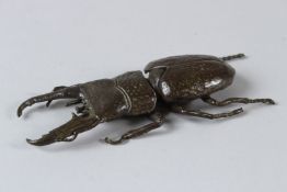 A JAPANESE OKIMONO BRONZE ARTICULATED STAG BEETLE. 12.5cms.