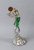 A RUSSIAN DECORATIVE COMPOSITE MODEL OF A STANDING FEMALE DANCER, with original box. 35cms high.