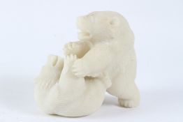 A CARVED WHITE HARDSTONE GROUP OF TWO PLAYFUL BEARS. 16cms high.