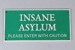 A NOVELTY CAST IRON SIGN 