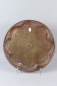 AN ISLAMIC TRAY. 49cms diameter.