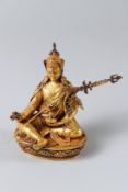 A GOOD TIBETAN BRONZE PADMASAMBHAVA STATUE . 10cms high.