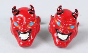 A PAIR OF STERLING SILVER RED DEVIL MASK ENAMEL CUFFLINKS.