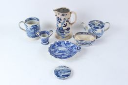A MIXED GROUP OF 19TH CENTURY TRANSFER PRINTED BLUE AND WHITE ITEMS, to include a tankard, leaf