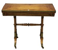 AN EARLY 19TH CENTURY MAPLE RECTANGULAR CARD TABLE, with foldover swivel top having an ormolu