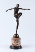 AFTER PHILIPP. An Art Deco style bronze figure of a dancer, on a circular marble base. 55cms high.