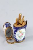 A GOOD 18TH CENTURY ENAMEL ETUI, blue ground with panels of flowers and container for implements.