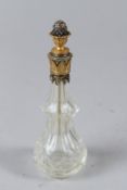 A RUSSIAN CUT GLASS AND SILVER GILT MOUNTED SCENT BOTTLE, inset with numerous small diamonds, in a
