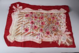 A GUCCI SILK SCARF, designed by V. Accornero, with poppies and wheatsheafs, complete with Gucci bag.