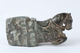 AN INDIAN CARVED GREEN HARDSTONE FIGURE, 19TH / 20TH CENTURY, modelled as the front end of a