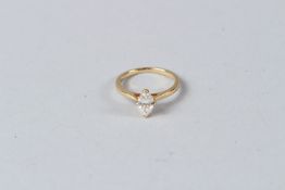 AN 18CT GOLD AND MARQUISE DIAMOND SINGLE STONE RING of approx. 0.75cts.