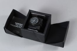 AN OMEGA SWATCH MISSION TO THE MOOPHASE BIOCERAMIC MOON SWATCH, boxed.