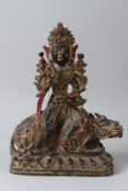 A TIBETAN GILT BRONZE MANJUSHRI STATUE. 33cms high.