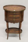 A LATE 19TH CENTURY FRENCH MAHOGANY, ROSEWOOD AND MARQUETRY OVAL TABLE, with a brass gallery,
