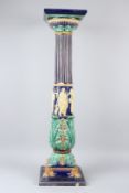 A LATE 19TH CENTURY CONTINENTAL MAJOLICA PEDESTAL OR JARDINIERE STAND of neo-classical design,