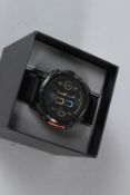 A GARMIN FENIX 8 WRISTWATCH, boxed.
