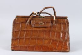 AN EARLY GUCCI CROCODILE SKIN BAG. 13ins long.