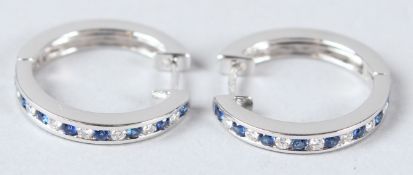 A PAIR OF 18CT WHITE GOLD, SAPPHIRE AND DIAMOND HOOP EARRINGS.