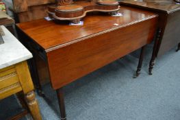 A 19th century mahogany Pembroke table.
