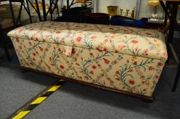 A large Victorian upholstered box ottoman.