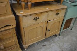 A small Victorian pine sideboard.