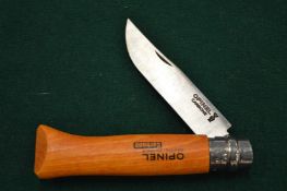 An Opinel No.8 penknife.