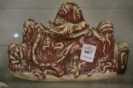 Chinese flambe glazed mountain group with dragon.