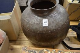 An Eastern metal vessel.