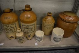 Two stoneware jars, labelled E G Palliser, Exeter Brewery and Railway Brewery, Bath and similar