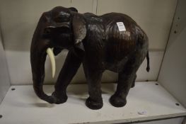 Possibly by Liberty, a leather model of an elephant.