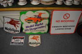 Enamel and other motoring signs.