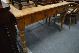 A satin walnut two drawer side table.