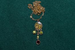 A decorative pendant and chain.