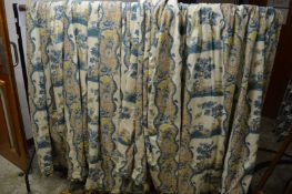 Three pairs of lined and interlined curtains with attached pelmets and fan edged trims, one pair