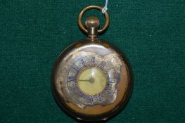 A gilt metal cased half hunter pocket watch.