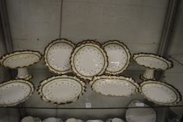 A George Jones dessert service comprising, a pair of tall tazza's, a low dish, an oval dish and