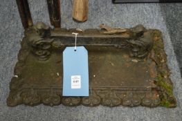 A cast iron boot scraper.