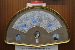 An 18th/19th century paper fan mounted in a shaped double sided case, painted with classical figures
