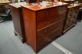 An Edwardian mahogany straight front chest of drawers.