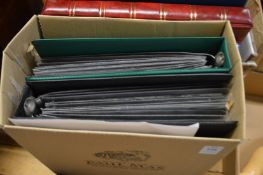 GB stamps, two Stanley Gibbons albums of 100 mint presentation packs, 1965-1999.