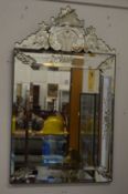 A Venetian style pier mirror.