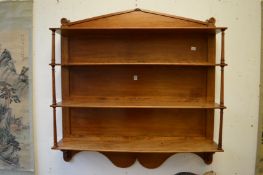 A good set of mahogany hanging shelves.