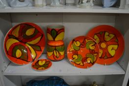 Five pieces of Poole Delphis pottery.