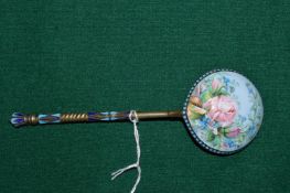 A Russian silver and enamel decorated spoon.